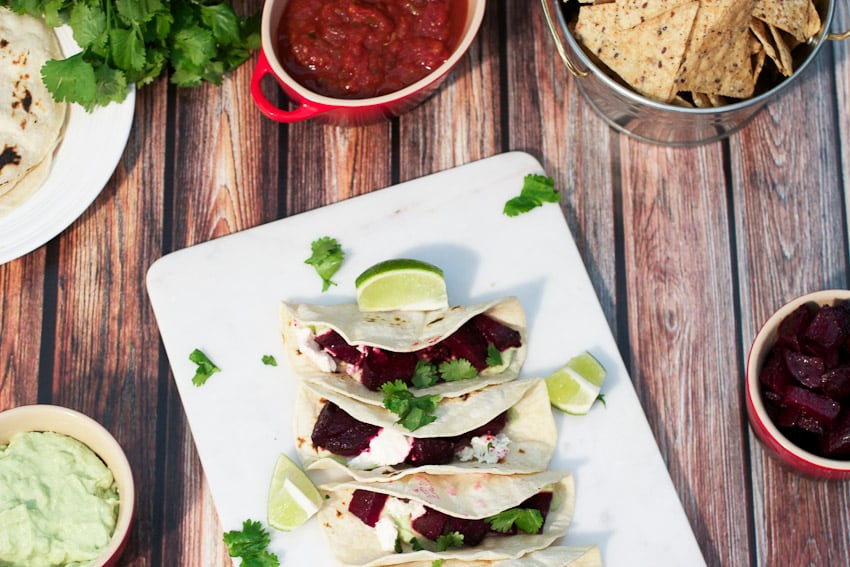 Beet and Goat Cheese Tacos with Avocado Cream from The Girl In The Little Red Kitchen