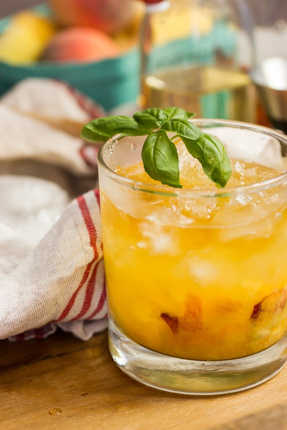 Bourbon Peach Basil Smash from The Girl In The Little Red Kitchen