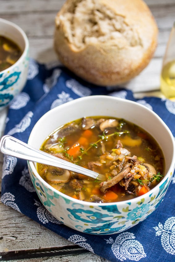 Mushroom and Farro Soup with tender chunks of beef | girlinthelittleredkitchen.com