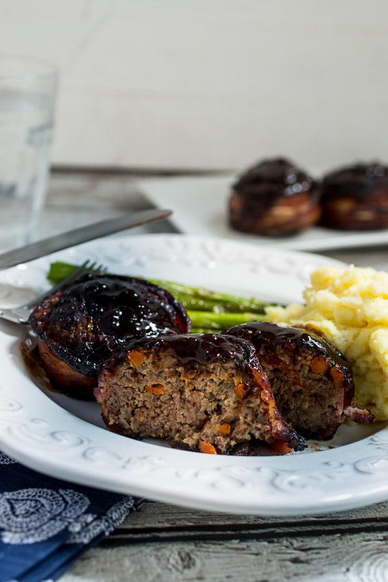 Bacon Wrapped Individual Meatloaf | girlinthelittleredkitchen.com