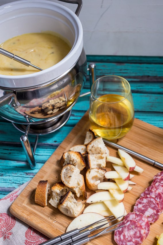 Roasted Garlic Cheese Fondue #SundaySupper from The Girl In The Little Red Kitchen