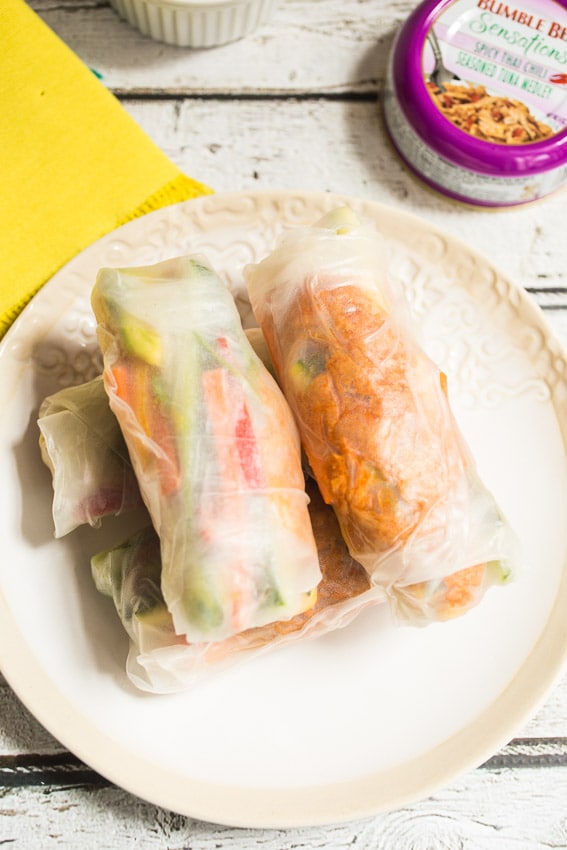 Spicy Thai Chili Tuna Summer Rolls filled with fresh vegetables, avocado, spicy tuna and herbs | girlinthelittleredkitchen.com