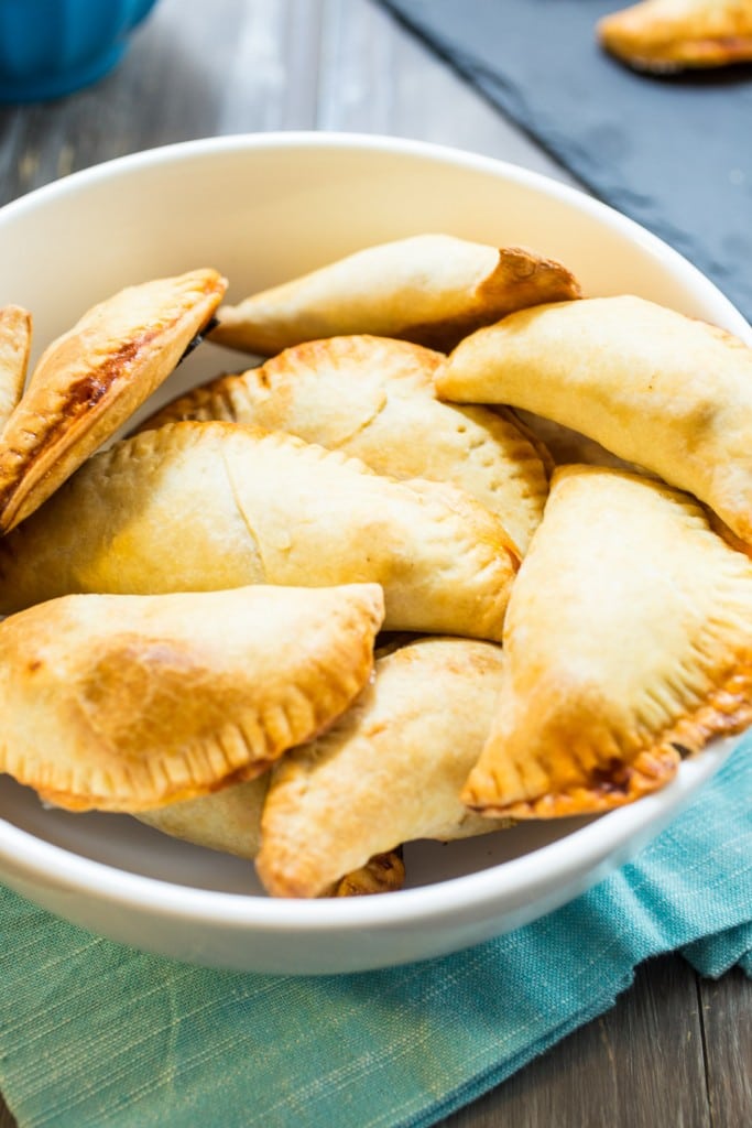 Beef and Chorizo Empanadas from The Girl In The Little Red Kitchen | Savory hand pies that are perfect for holiday entertaining.  Filled with picadillo beef and chorizo and a flaky pastry crust. 