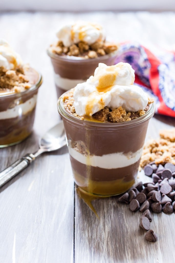 Chocolate Caramel Pudding Parfait from The Girl In The Little Red Kitchen | Full of rich dark chocolate pudding, whipped cream, caramel and crumb topping. 