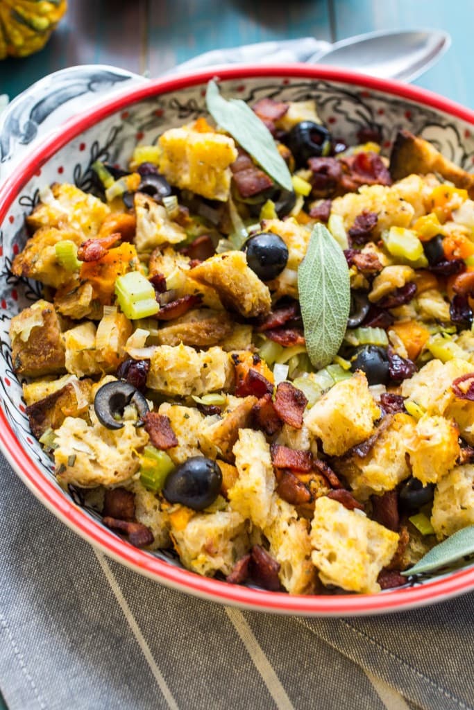 Sourdough Butternut Squash Olive Stuffing from The Girl In The Little Red Kitchen | Serve this fall flavored stuffing alongside your turkey on Thanksgiving or anytime of the year! 