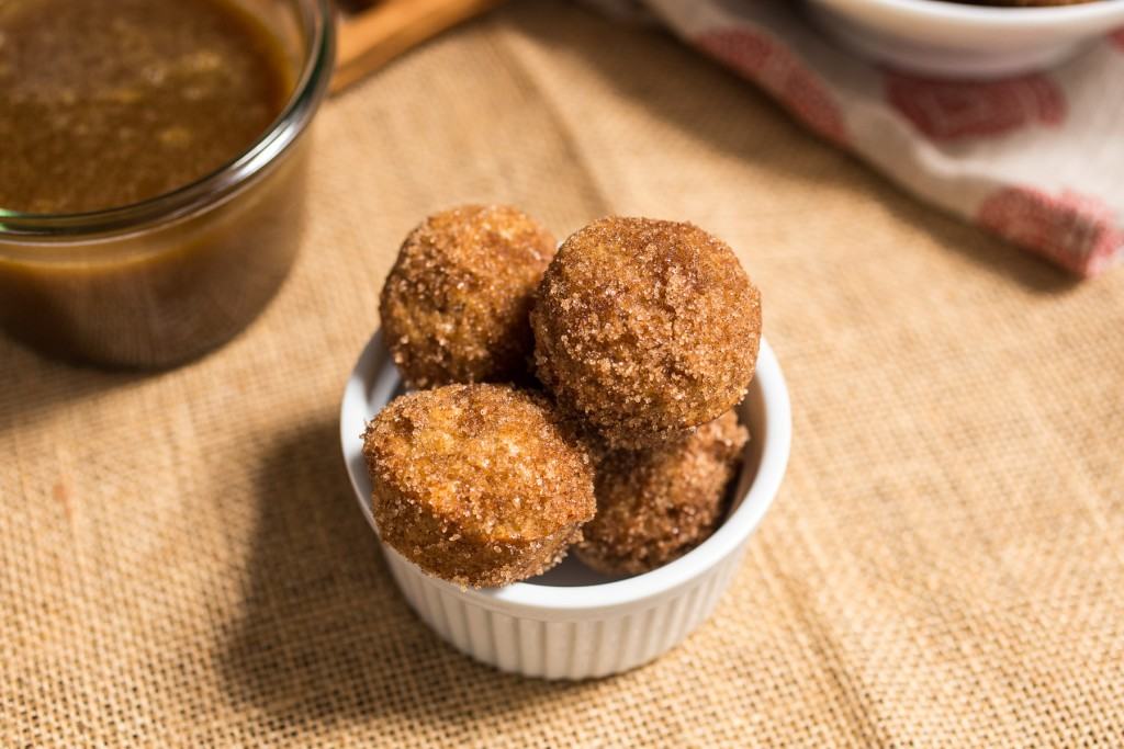 Apple Cider Donut Holes with Hot Buttered Rum Dipping Sauce |girlinthelittleredkitchen.com