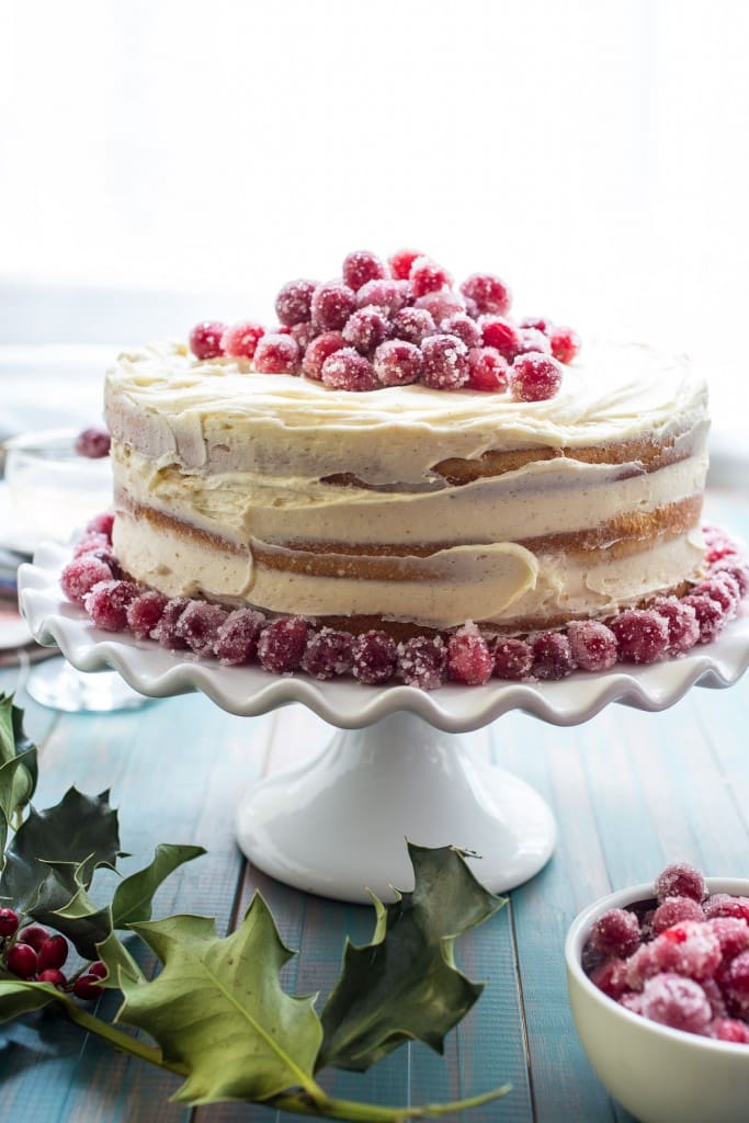 Cranberry Champagne Cake from The Girl In The Little Red Kitchen | Champagne scented and filled with cranberry this cake will be the shining centerpiece of any table. 