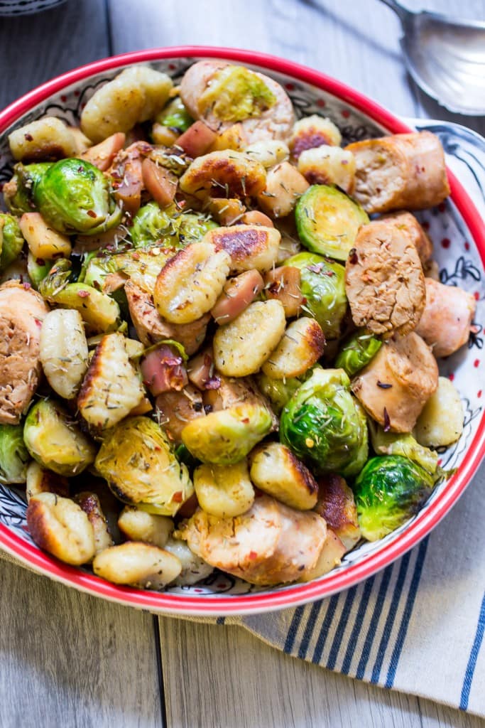 Gnocchi with Chicken Sausage, Brussels Sprouts and Apples from The Girl In The Little Red Kitchen | Hearty, comforting and healthy this meal will keep you satisfied all winter long. 