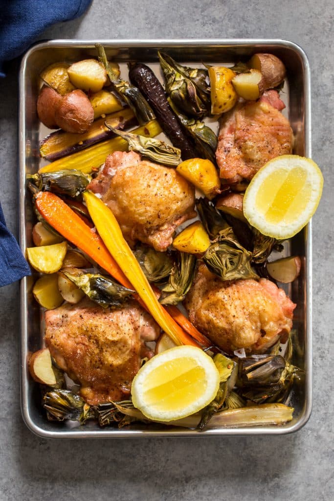 Sheet Pan Chicken with Baby Artichokes and Carrots | girlinthelittleredkitchen.com